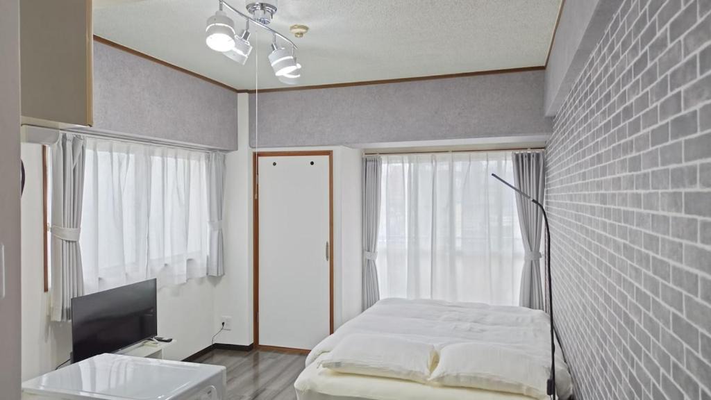 Kurume Apartment | 充実した設備のローコストルーム 福岡空港から高速バス直行