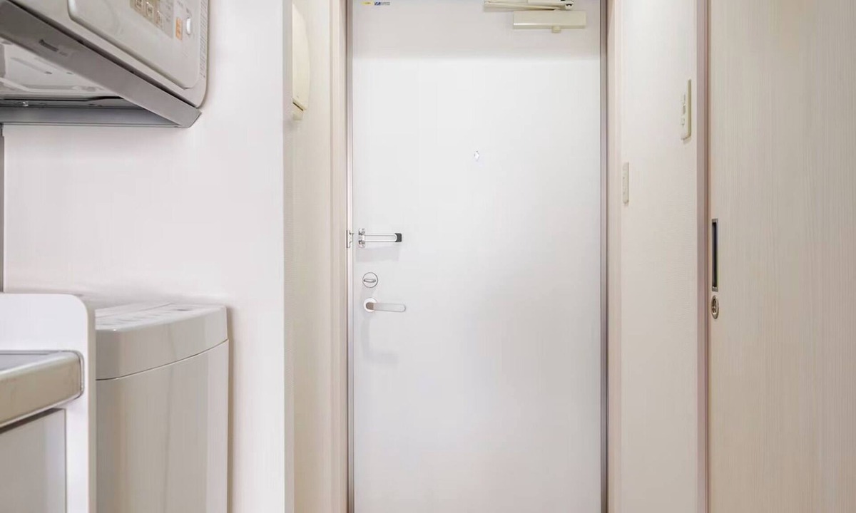 Naha City Centre Apartment | A queensize bed and a sofa bed make this a comfor/Naha Okinawa