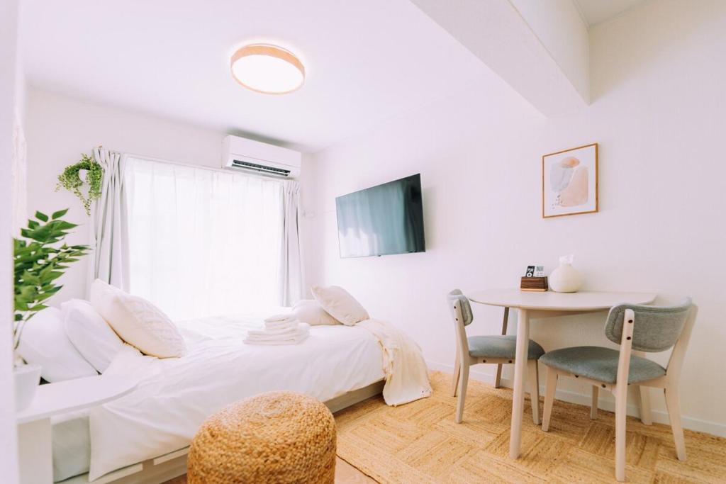Susakiuramachi Apartment | Chic 1 Bedroom Space Near Nakasu