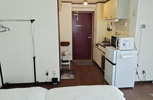 Kurume Apartment | 充実した設備のローコストルーム 福岡空港から高速バス直行
