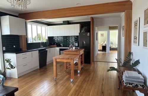 Nukuhou Cottage | Accessible Ohope Beach Country Cottage with hot tub and indoor wood fire