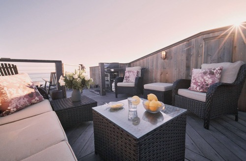 Montecito House | Beachfront Retreat On Sand with Charming Nautical Features | Lower Unit