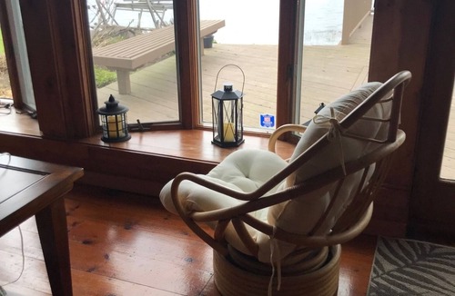 Sodus Point Cottage | Charming Cottage on the Bay and Golf Course with private patio and boat dock.