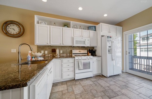 Saugatuck Condo | Experience comfort in this 3-bedroom townhome with stunning water views in downtown Saugatuck.