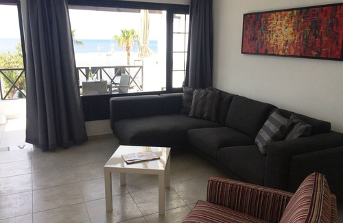 Puerto del Carmen Apartment | Front line, contemporary, stunning sea views, pool, WiFi, SKY