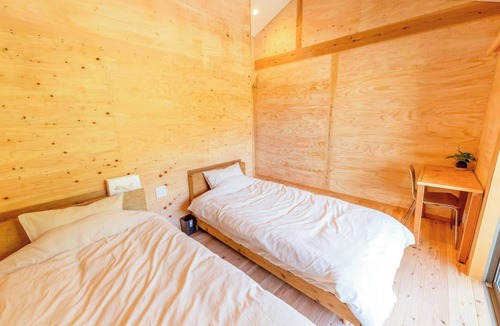 Amami Hotel | Guest House Amami Long Beach 2
