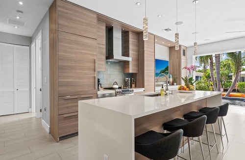 Wilton Manors House | Heated Pool, Modern Spacious Waterway Home Offering Comfort, Style & Total Relaxation!