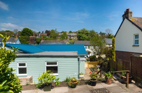 Lyme Regis Cottage | Homestead, Lyme Regis is a cosy riverside cabin, 10 mins walk from the beach