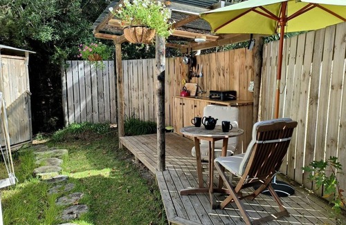 Oneroa RV Rental | Luxury Hillside Glamping with Outdoor Kitchen near Waiheke Island, New Zealand