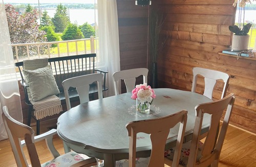 Bayview Cottage | Ocean view cottage with a perfect wrap around deck to watch beautiful sunsets.