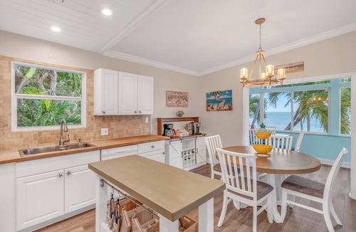 Tavernier House | Oceanfront Estate with Private 350 foot Pier, Heated Pool, Pet Friendly