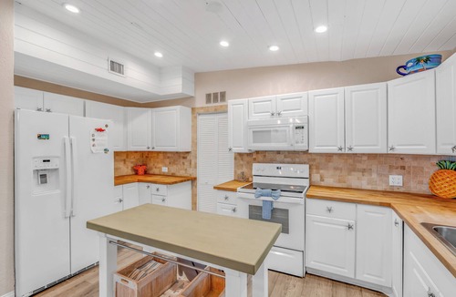 Tavernier House | Oceanfront Estate with Private 350 foot Pier, Heated Pool, Pet Friendly