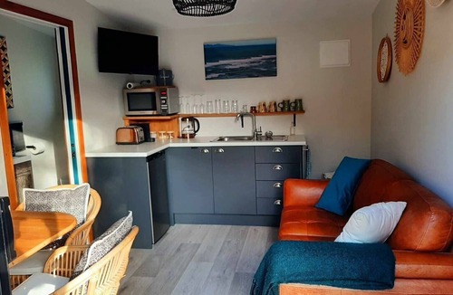 Waihi Beach Cabin | Peace of Bali 1 bed cabin set in a tropical garden with WiFi & AC in Waihi Beach