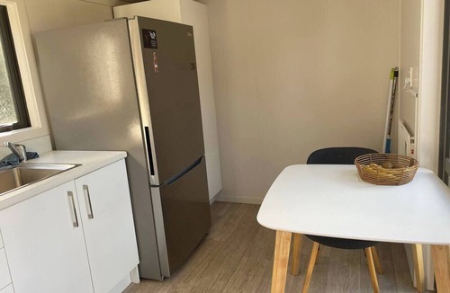 Papamoa House | Pods Retreat with friendly farm animals, Pod Retreat, with outdoor bath and farm pets.