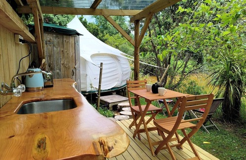 Oneroa RV Rental | Tranquil Pondside Glamping with Outdoor Kitchen near Wildlife Haven in Waiheke Island, NZ