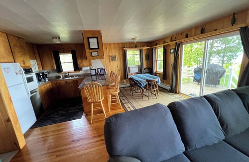 Traverse City House | Traverse City Lake Front w/Fireplace, Sauna, & Kayaks. Dogs welcome. June Avail