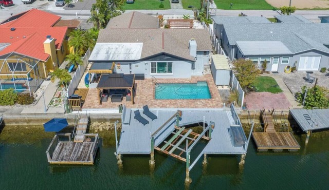 4BR Waterfront | Boat Dock + Pool | 11-Min Walk to Beach | Sleeps 8
