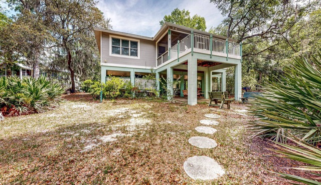 Dog-friendly, riverfront home with screened porch, firepit, & private dock