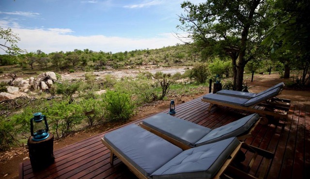 Ivory Wilderness River Rock Lodge