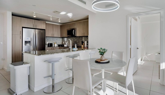 Modern 2BR Residence with open views & Balcony
