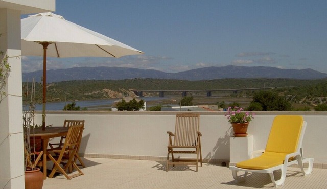Penthouse apartment with stunning private roof terrace, river and mountain view