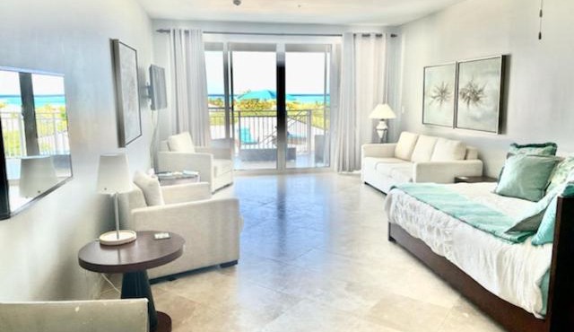 Private Poolside, Loft-Like Condo with Panoramic Grace Bay Views, Walk to Beach, Restaurants, & Turtle Cove Marina!