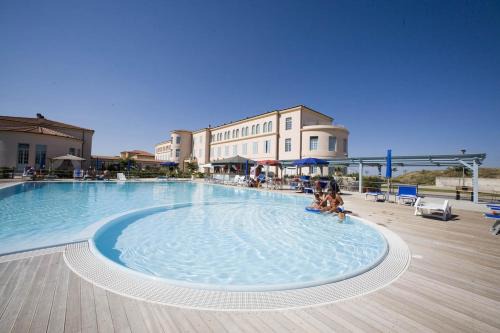 Residence sul mare all'interno del parco naturale con piscina