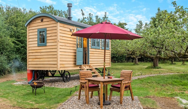 Set among the fruit trees with views of the fields.