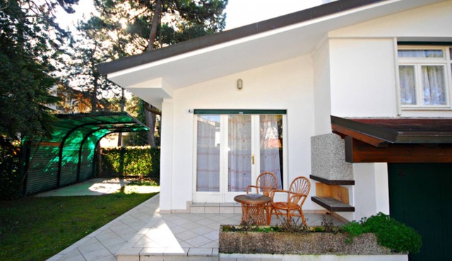 Villa with an outdoor fireplace