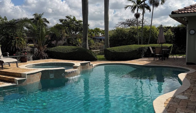 Waterfront Property with a resort style backyard and Heated Pool in Miami