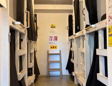 Single Bed in Dormitory Room