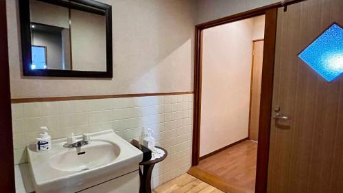 Single Room with Shared Shower and Toilet