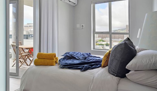 Sunny Corner Apartment with 180° Ocean, City & Mountain Views